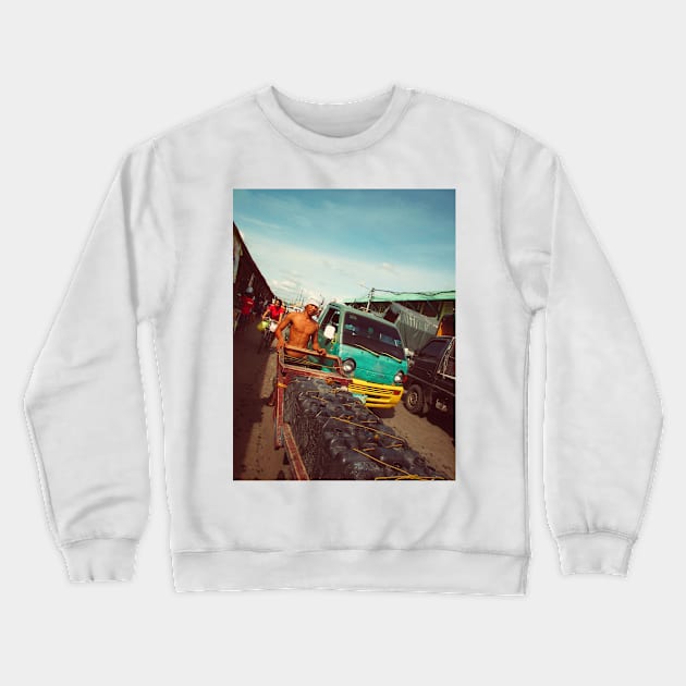 Filipino worker on a street market, Cebu city, Philippines. Crewneck Sweatshirt by Nalidsa